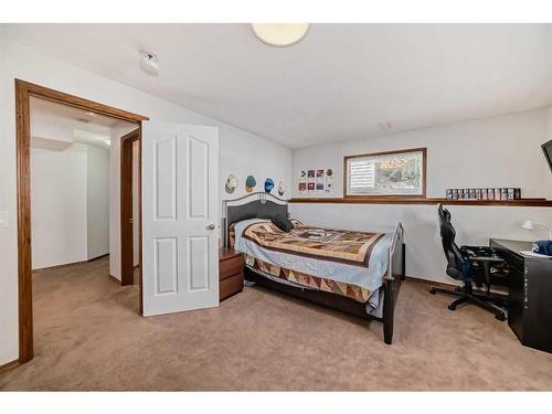 134 Bow Ridge Court, Cochrane, AB - Indoor Photo Showing Bedroom