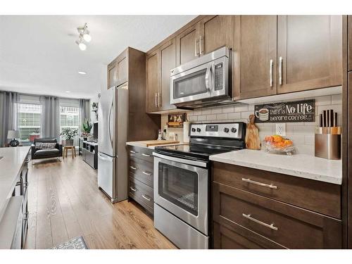 428 Cranford Mews Se, Calgary, AB - Indoor Photo Showing Kitchen With Stainless Steel Kitchen With Upgraded Kitchen