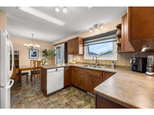 25 Beech Crescent, Olds, AB - Indoor Photo Showing Kitchen With Double Sink