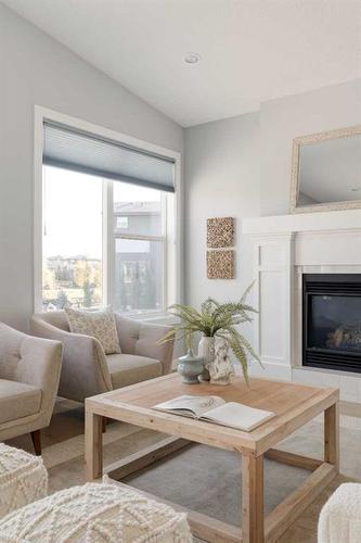 32 Walden Place Se, Calgary, AB - Indoor Photo Showing Living Room With Fireplace