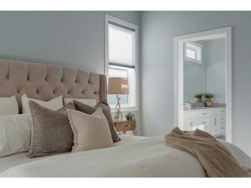 32 Walden Place Se, Calgary, AB - Indoor Photo Showing Bedroom