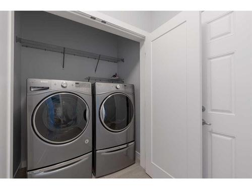 32 Walden Place Se, Calgary, AB - Indoor Photo Showing Laundry Room