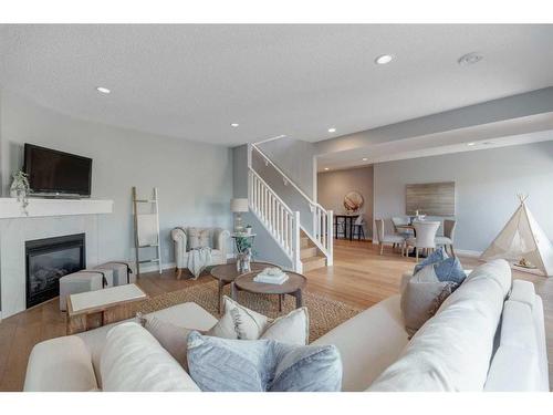 32 Walden Place Se, Calgary, AB - Indoor Photo Showing Living Room With Fireplace