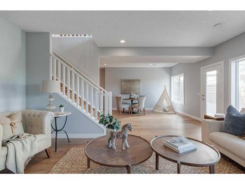 32 Walden Place Se, Calgary, AB - Indoor Photo Showing Living Room