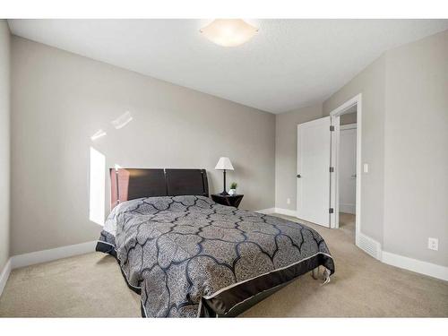 311 Silverado Crest Landing Sw, Calgary, AB - Indoor Photo Showing Bedroom