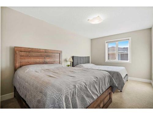 311 Silverado Crest Landing Sw, Calgary, AB - Indoor Photo Showing Bedroom