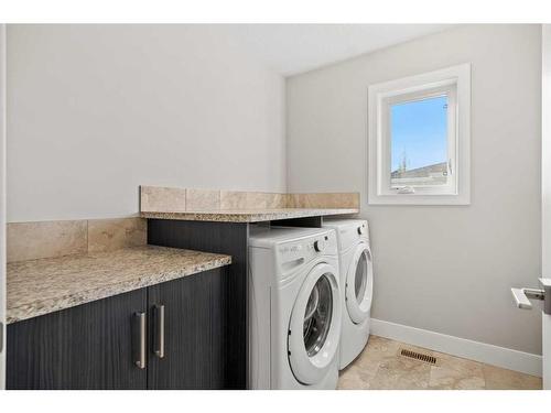 311 Silverado Crest Landing Sw, Calgary, AB - Indoor Photo Showing Laundry Room