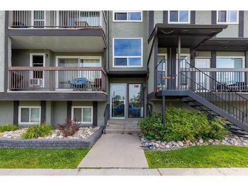 105-205 5 Avenue Ne, Calgary, AB - Outdoor With Deck Patio Veranda With Facade