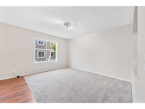 503-800 Yankee Valley Boulevard Se, Airdrie, AB - Indoor Photo Showing Other Room