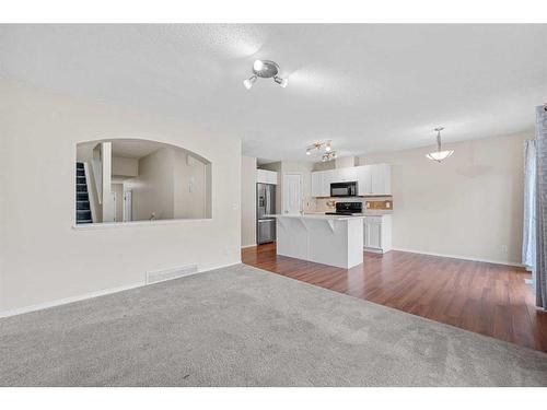 503-800 Yankee Valley Boulevard Se, Airdrie, AB - Indoor Photo Showing Kitchen