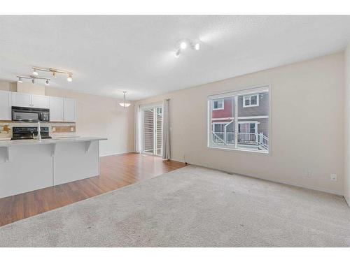 503-800 Yankee Valley Boulevard Se, Airdrie, AB - Indoor Photo Showing Kitchen