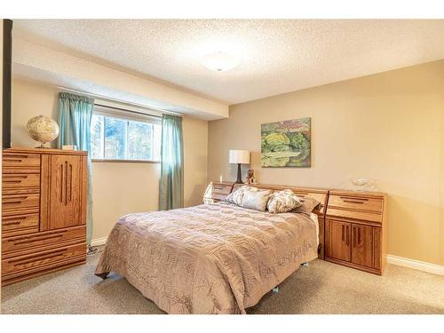 104 Millbank Close Sw, Calgary, AB - Indoor Photo Showing Bedroom