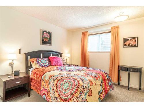 104 Millbank Close Sw, Calgary, AB - Indoor Photo Showing Bedroom