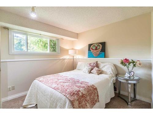 104 Millbank Close Sw, Calgary, AB - Indoor Photo Showing Bedroom