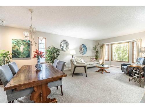 104 Millbank Close Sw, Calgary, AB - Indoor Photo Showing Living Room