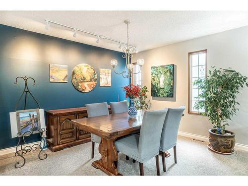 104 Millbank Close Sw, Calgary, AB - Indoor Photo Showing Dining Room