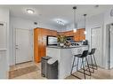 208-1408 17 Street Se, Calgary, AB  - Indoor Photo Showing Kitchen 