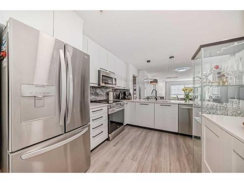 228-22 Richard Place Sw, Calgary, AB - Indoor Photo Showing Kitchen With Stainless Steel Kitchen With Upgraded Kitchen