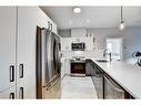 131-69 Springborough Court Sw, Calgary, AB  - Indoor Photo Showing Kitchen With Stainless Steel Kitchen With Double Sink With Upgraded Kitchen 