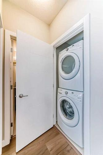 208-20 Sage Hill Terrace Nw, Calgary, AB - Indoor Photo Showing Laundry Room