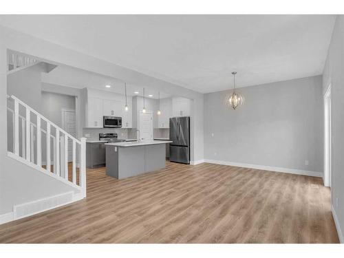 957 Cobblemore Common Sw, Airdrie, AB - Indoor Photo Showing Kitchen