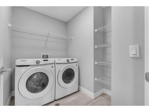 957 Cobblemore Common Sw, Airdrie, AB - Indoor Photo Showing Laundry Room