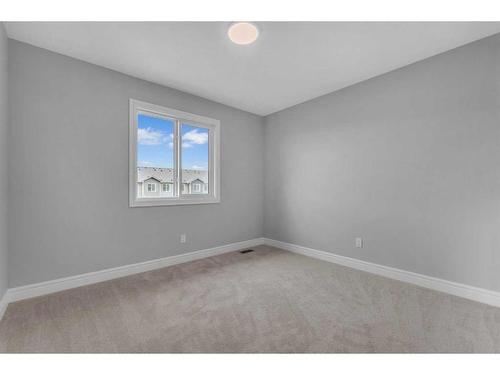 957 Cobblemore Common Sw, Airdrie, AB - Indoor Photo Showing Other Room