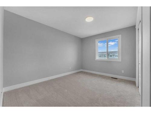 957 Cobblemore Common Sw, Airdrie, AB - Indoor Photo Showing Other Room