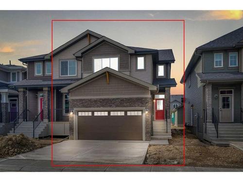 957 Cobblemore Common Sw, Airdrie, AB - Outdoor With Facade