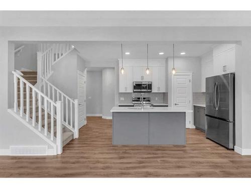 957 Cobblemore Common Sw, Airdrie, AB - Indoor Photo Showing Kitchen