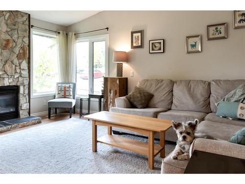 6724 Ranchview Drive Nw, Calgary, AB - Indoor Photo Showing Living Room With Fireplace