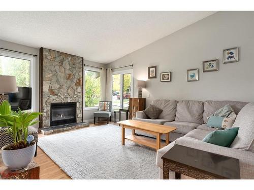 6724 Ranchview Drive Nw, Calgary, AB - Indoor Photo Showing Living Room With Fireplace