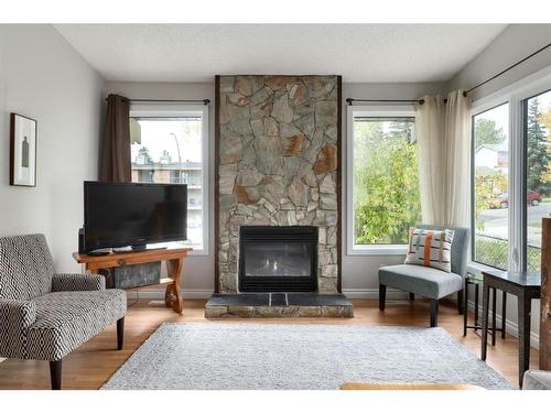 6724 Ranchview Drive Nw, Calgary, AB - Indoor Photo Showing Living Room With Fireplace