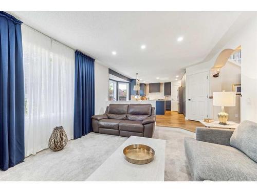 359 Mountain Park Drive Se, Calgary, AB - Indoor Photo Showing Living Room