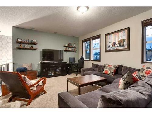 263 Sunset View, Cochrane, AB - Indoor Photo Showing Living Room