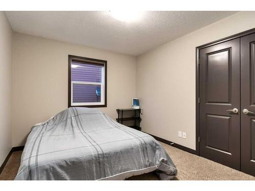 263 Sunset View, Cochrane, AB - Indoor Photo Showing Bedroom