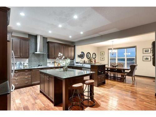 263 Sunset View, Cochrane, AB - Indoor Photo Showing Kitchen With Upgraded Kitchen