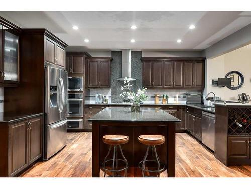 263 Sunset View, Cochrane, AB - Indoor Photo Showing Kitchen With Stainless Steel Kitchen With Upgraded Kitchen