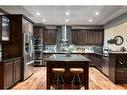 263 Sunset View, Cochrane, AB  - Indoor Photo Showing Kitchen With Stainless Steel Kitchen With Upgraded Kitchen 