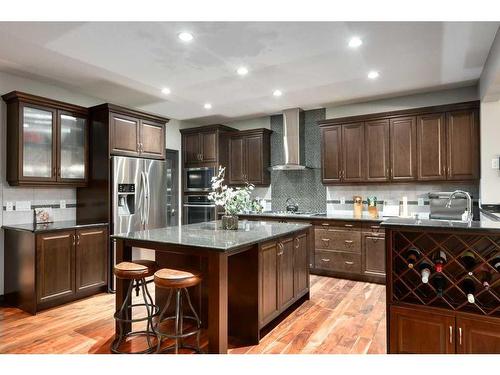 263 Sunset View, Cochrane, AB - Indoor Photo Showing Kitchen With Stainless Steel Kitchen With Upgraded Kitchen