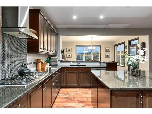 263 Sunset View, Cochrane, AB - Indoor Photo Showing Kitchen With Upgraded Kitchen