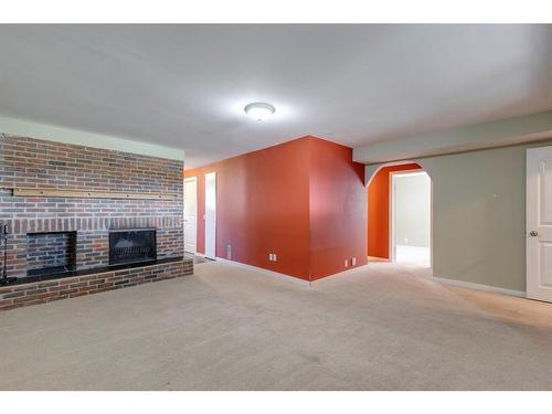 5032 Whitestone Road Ne, Calgary, AB - Indoor With Fireplace