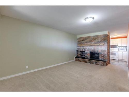 5032 Whitestone Road Ne, Calgary, AB - Indoor With Fireplace