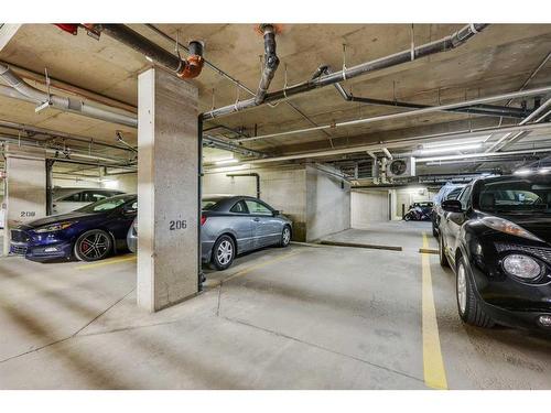 155-35 Richard Court Sw, Calgary, AB - Indoor Photo Showing Garage