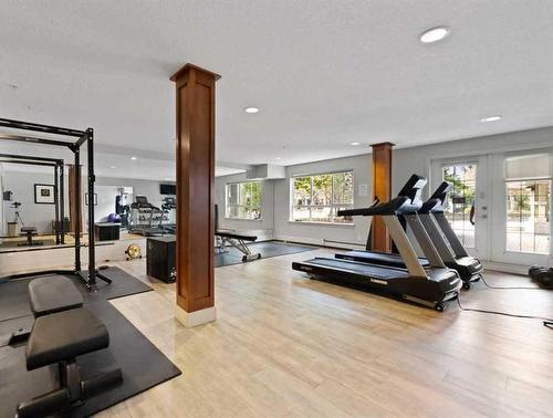 155-35 Richard Court Sw, Calgary, AB - Indoor Photo Showing Gym Room