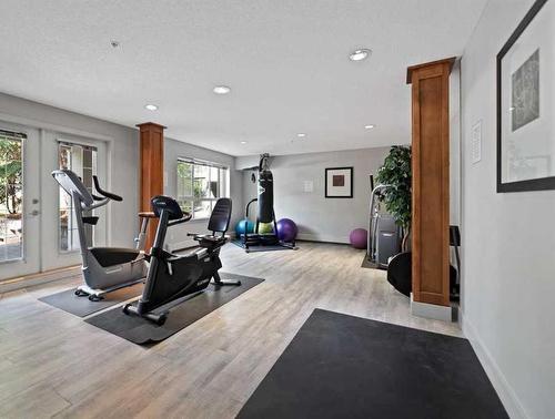 155-35 Richard Court Sw, Calgary, AB - Indoor Photo Showing Gym Room