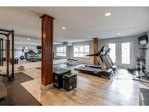 155-35 Richard Court Sw, Calgary, AB - Indoor Photo Showing Gym Room