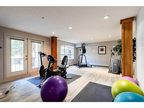 155-35 Richard Court Sw, Calgary, AB - Indoor Photo Showing Gym Room