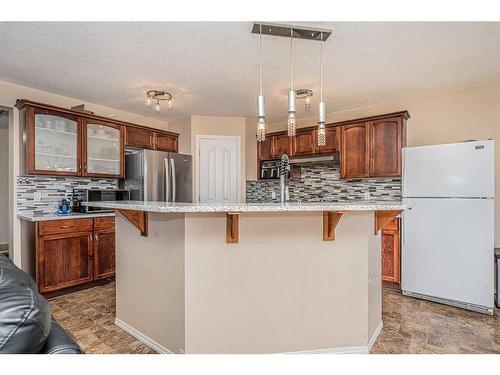 57 Saddlecrest Park Ne, Calgary, AB - Indoor Photo Showing Kitchen