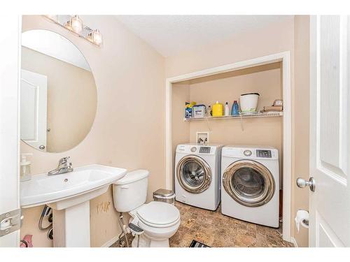 57 Saddlecrest Park Ne, Calgary, AB - Indoor Photo Showing Laundry Room